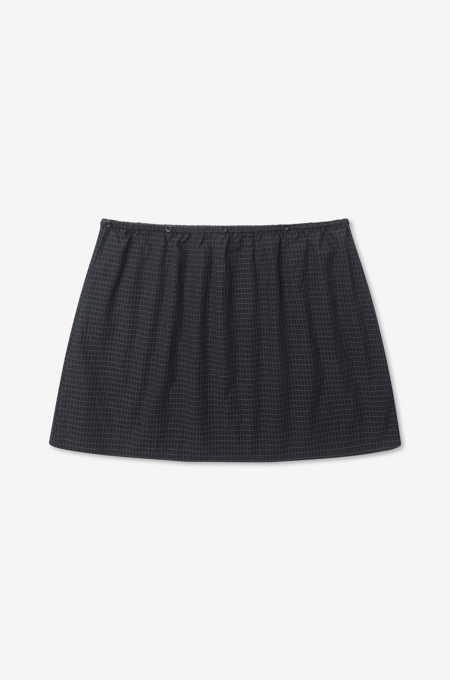 A black mini skirt with an elastic waistband and a subtle textured grid pattern, perfect for pairing with the Flow Top - Mono Grid, displayed on a plain white background.