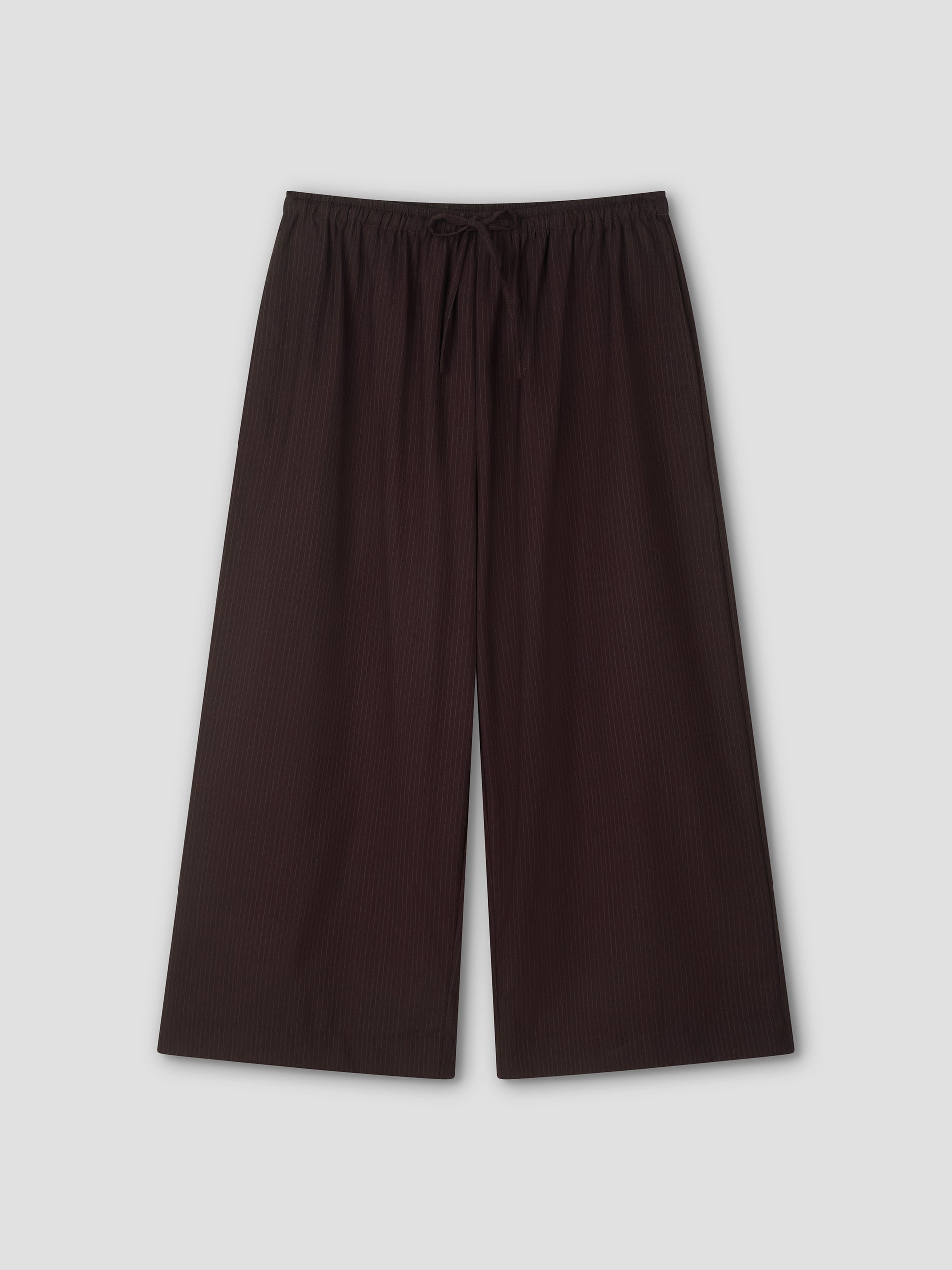 Wide-leg, ankle-length Drawcord Culotte in Burgundy Brown Stripe with subtle vertical pinstripes and elasticated waistband, laid flat on a light gray background. Inspired by the relaxed yet refined style of Deiji Studios.