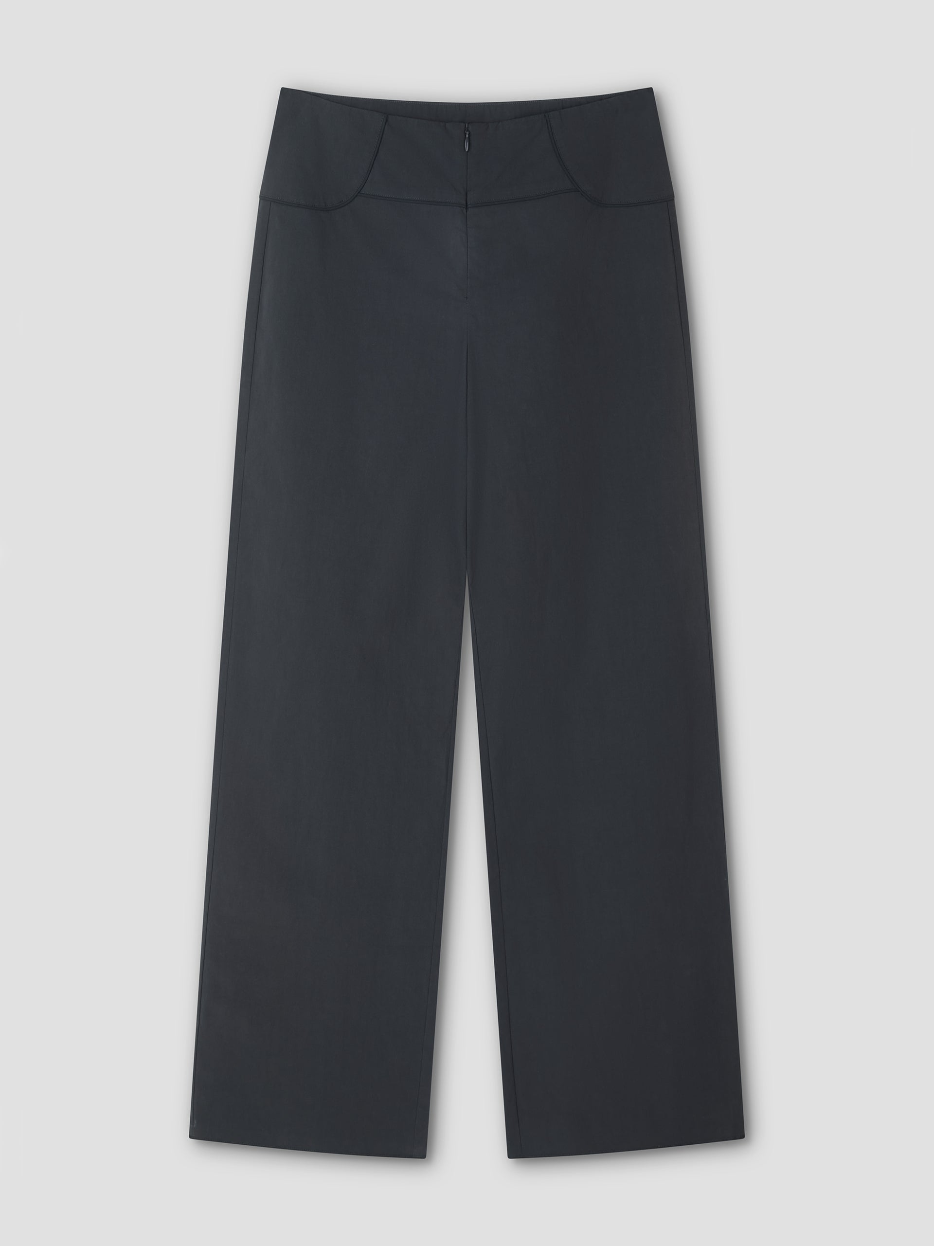 The Panelled Pant - Charcoal by Deiji Studios, featuring a wide-leg, high-waisted design with smooth front, minimal seams, and a clean finish, is laid flat against a light gray background.