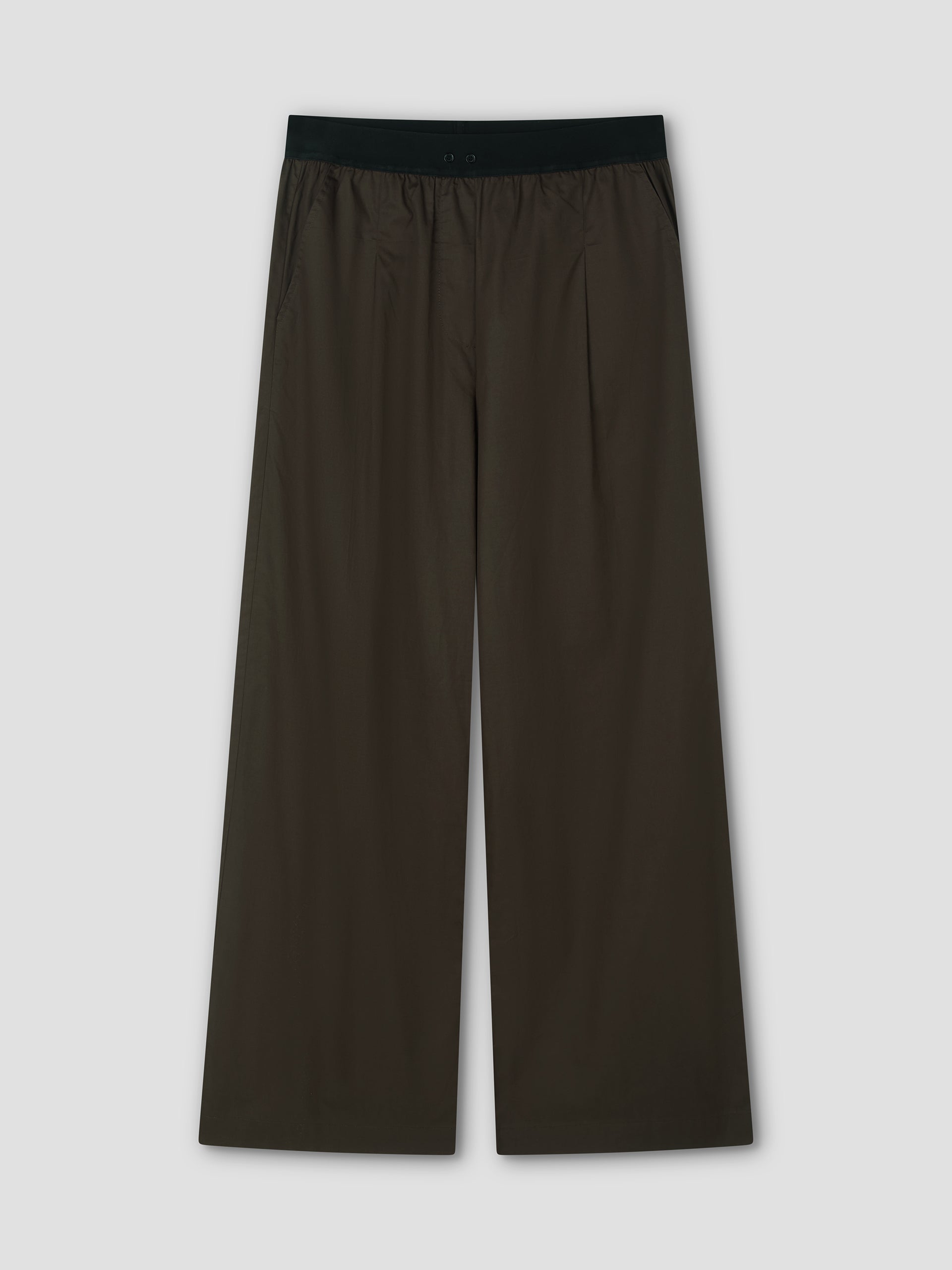 The Contrast Waist Pant - Brown by Deiji Studios features a black elastic waistband, side pockets, and a relaxed straight leg fit. Shown laid flat on a light gray background.