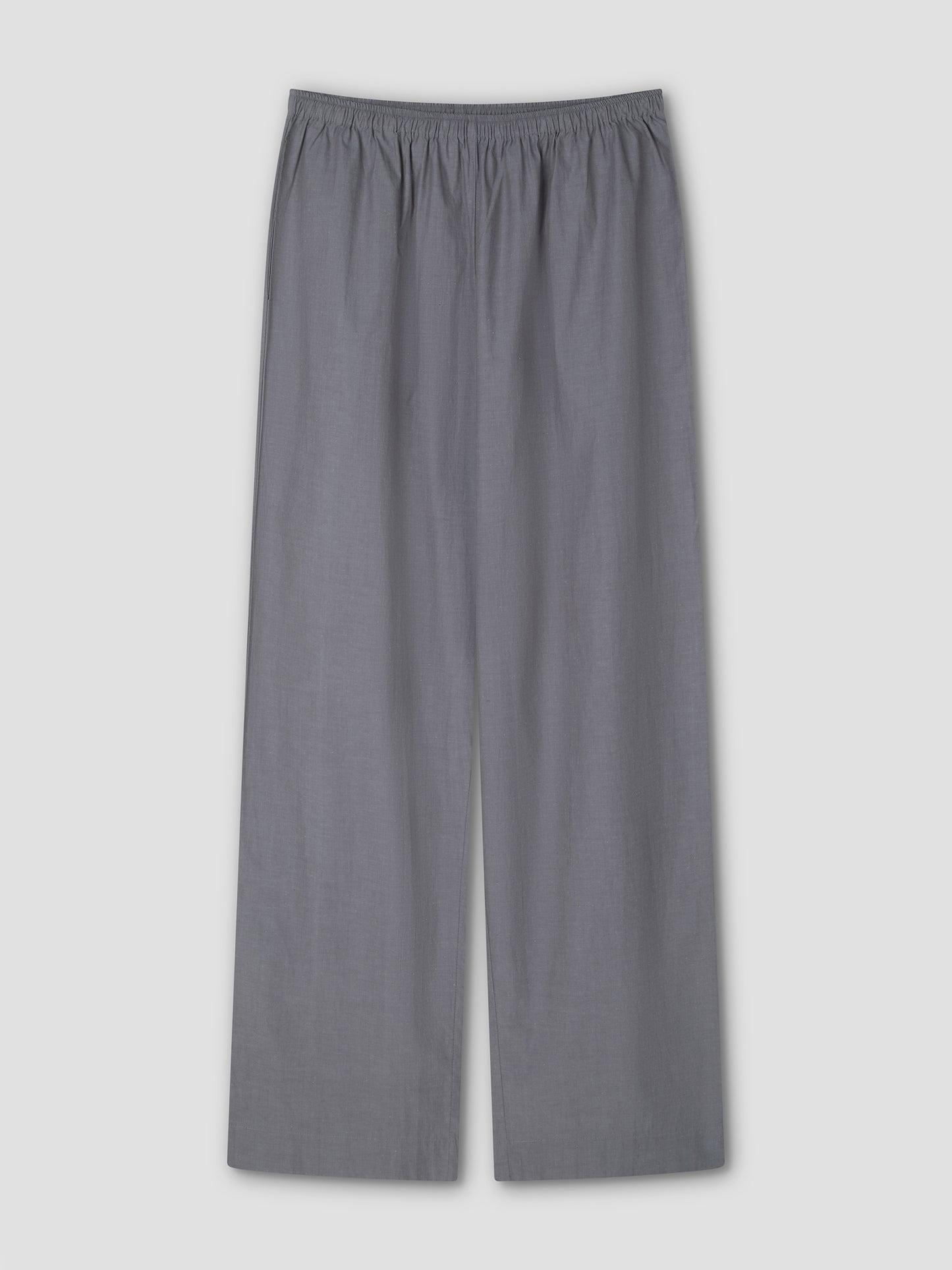 The Ease Trouser - Currant by Deiji Studios is a loose-fitting, wide-leg pant with an elastic waistband and ankle length, shown flat on a light gray background.