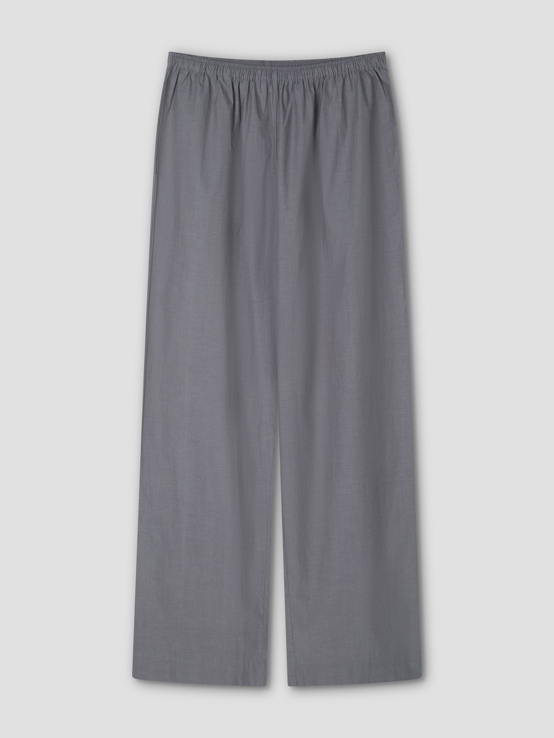 The Ease Trouser - Currant by Deiji Studios is a loose-fitting, wide-leg pant with an elastic waistband and ankle length, shown flat on a light gray background.