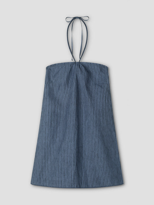 The Cross Over Dress - Azure Stripe is a sleeveless mini dress with blue and black pinstripes, a straight neckline, and tie-up straps, shown flat on a light grey background.