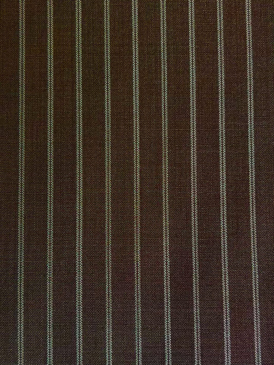 Pure Wool Ease Trouser - Sable Stripe features dark brown fabric with thin, evenly spaced vertical white pinstripes—perfect for relaxed or tailored looks. The stripes run parallel across the whole surface.
