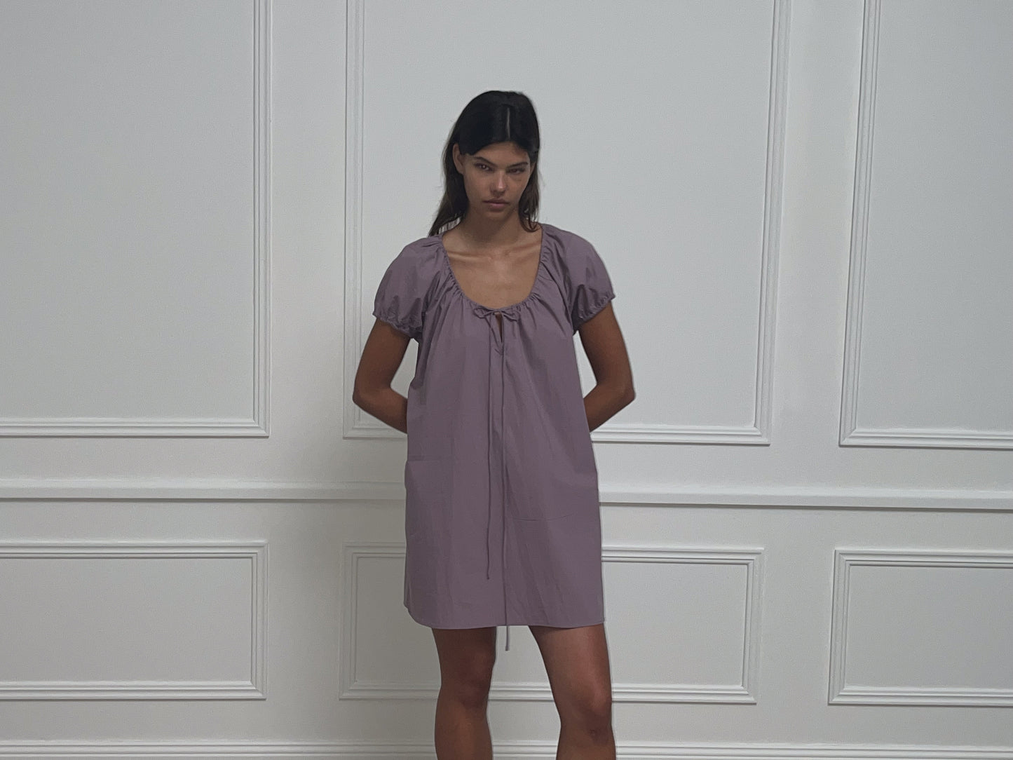 Female model wearing Capped Sleeve Dress - Mauve by Deiji Studios against plain background