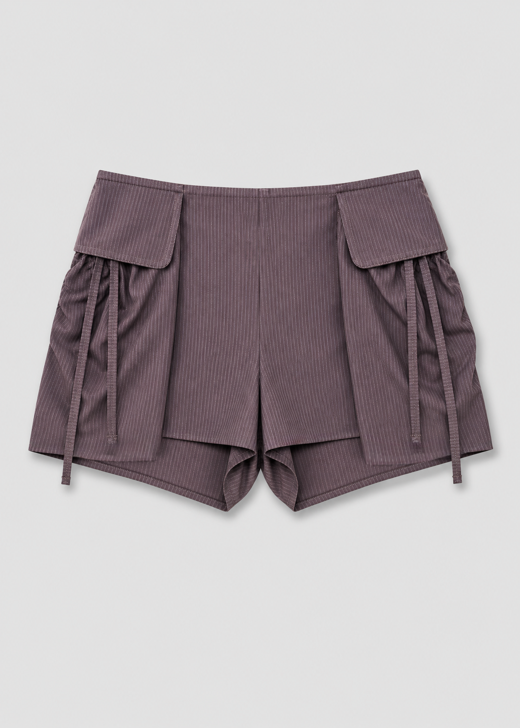 The Deiji Studios Micro Pocket Short in Mulberry Stripe features a high waist, wide leg openings, large flap pockets, and decorative side fabric ties, shown here against a plain light background.