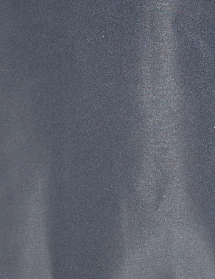 A close-up of a smooth, shiny slate-gray fabric with subtle light reflections and a slightly metallic sheen, evocative of the luxurious materials featured in the Gathered Jacket - Slate by deiji studios.