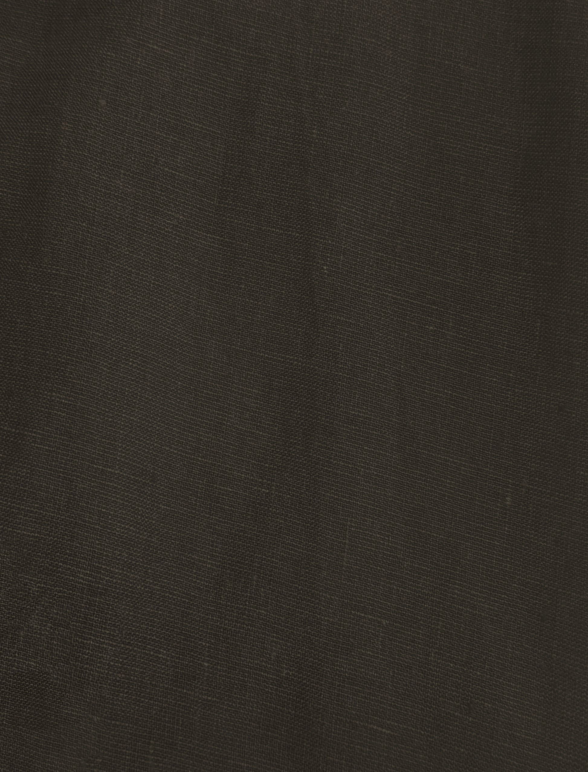 Close-up of Sheets - Bark shows dark brown woven fabric with a fine weave and subtle natural creases, reminiscent of eco-friendly linen.