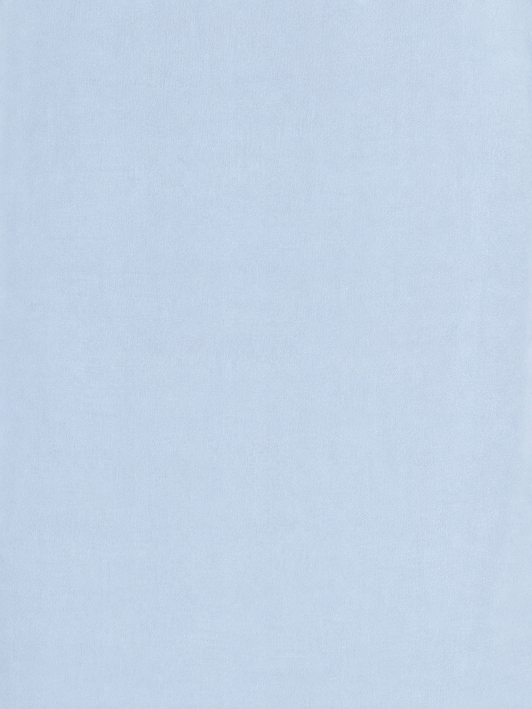Close-up of the Baby Blue fabric by Deiji Studios: a smooth, lightweight baby blue cotton, shown flat.