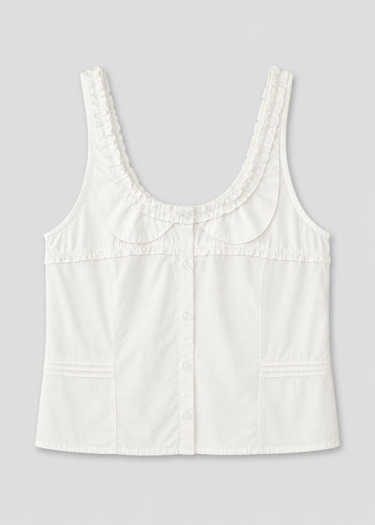 The Frills Top - White is a sleeveless cotton poplin blouse featuring a scooped neckline, ruffled frill trim on the collar, subtle vertical seams, and a fitted silhouette that captures Deiji Studios' signature elegance.