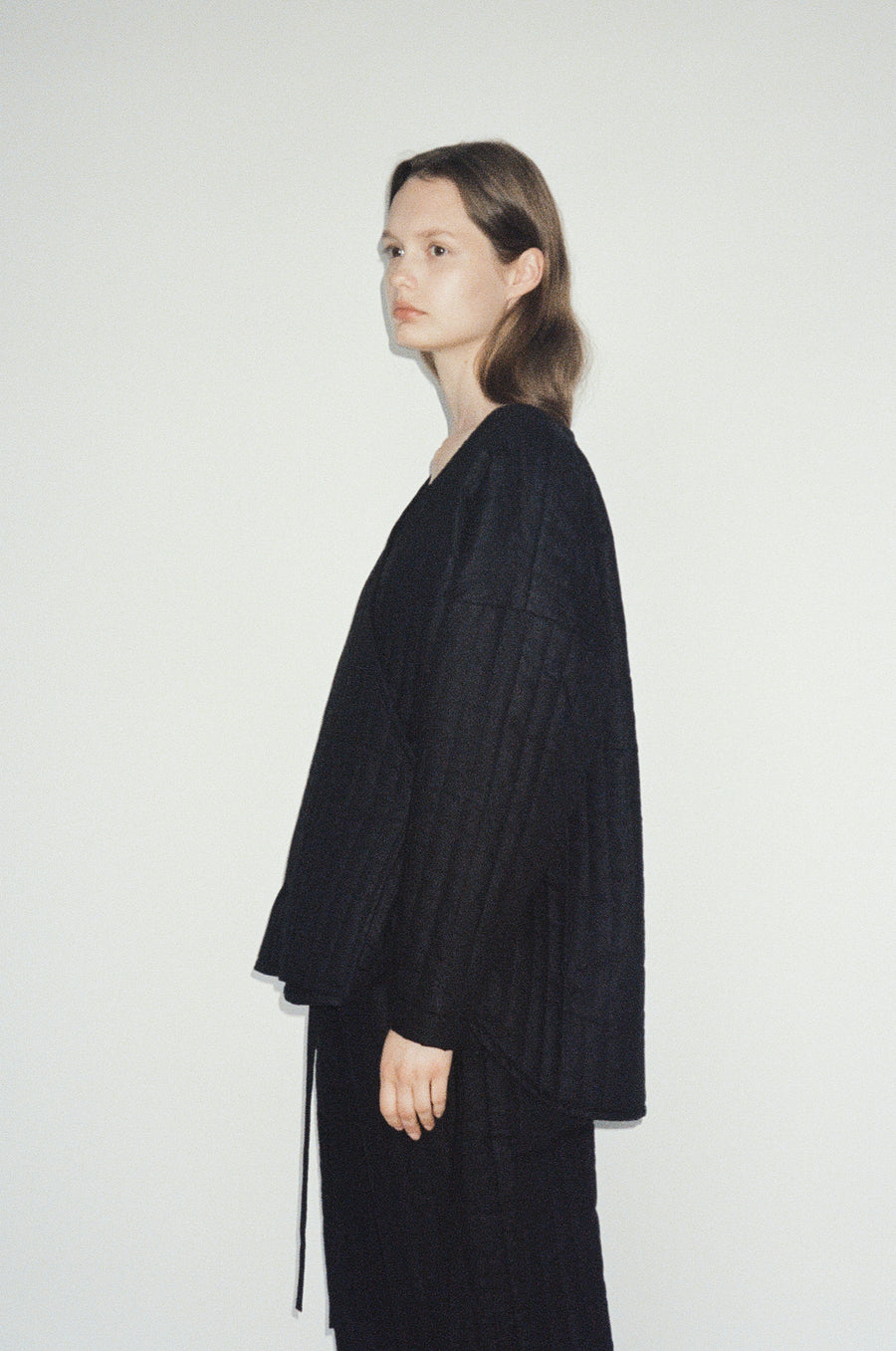 the curved quilt jacket - black