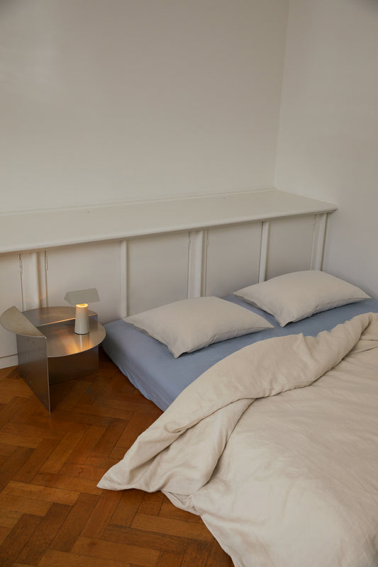 Light room with queen bed and pillows topped with Pillow slip set - Oatmeal by Deiji Studios
