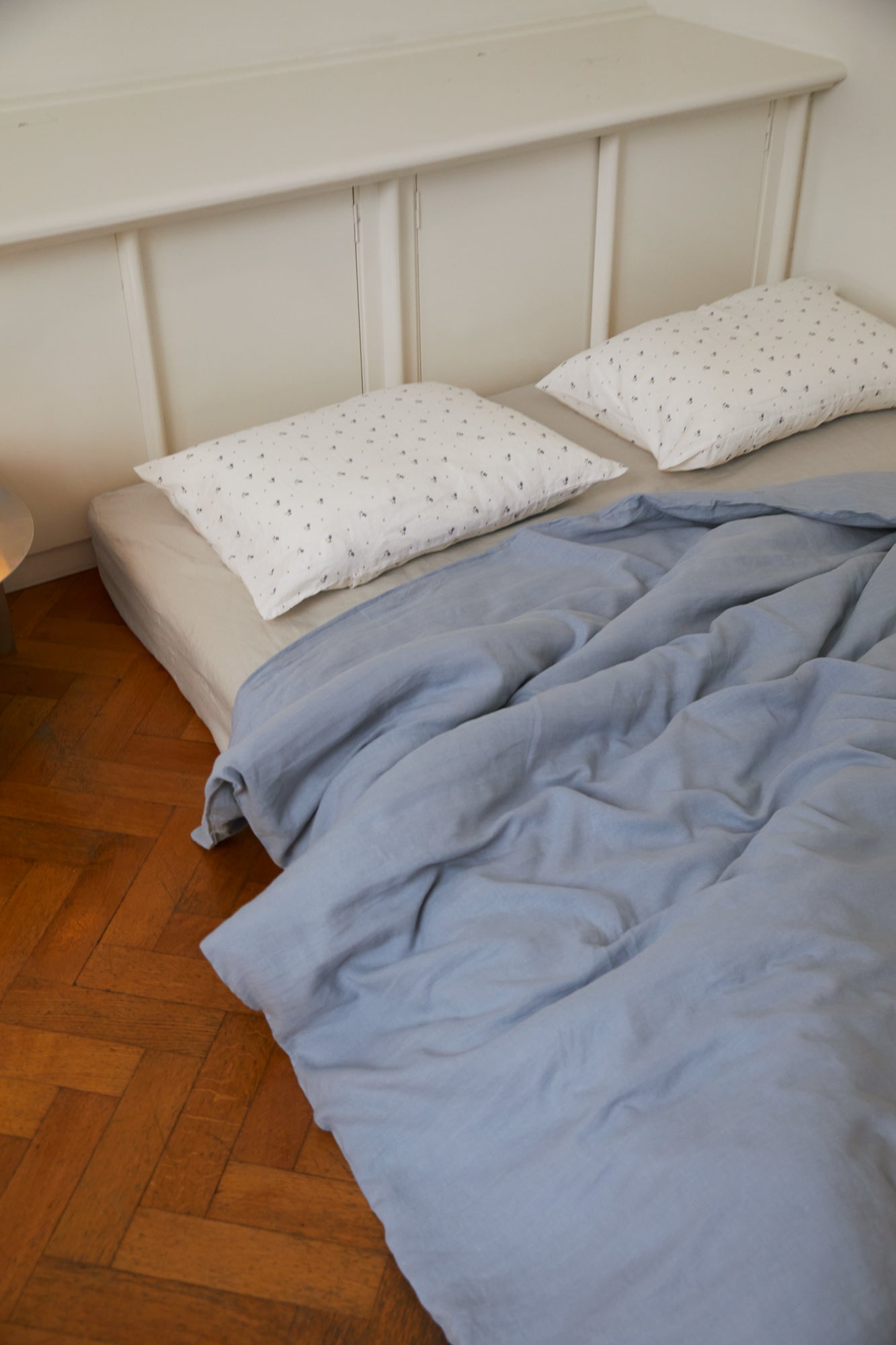 Soft bed with Duvet cover - Cornflower by Deiji Studios against light wall