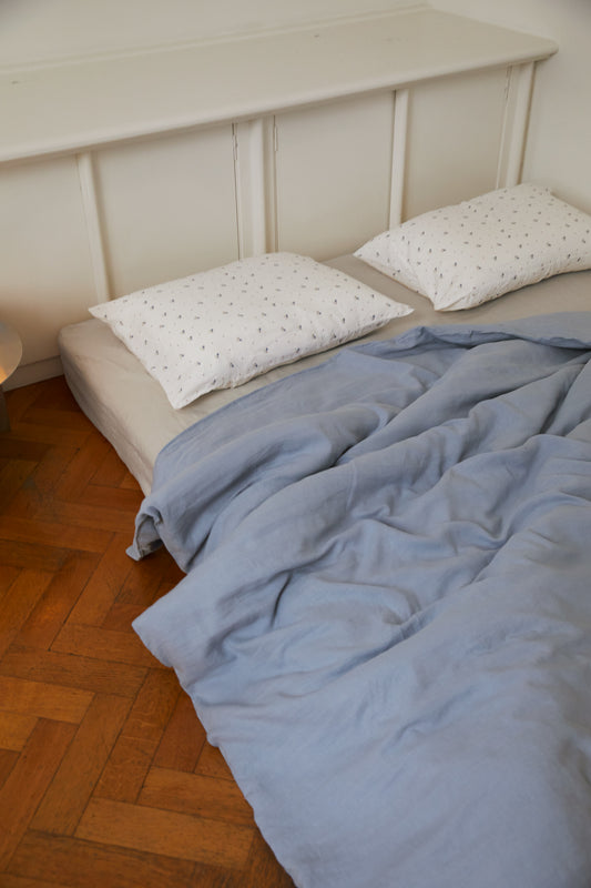 Soft bed with Duvet cover - Cornflower by Deiji Studios against light wall