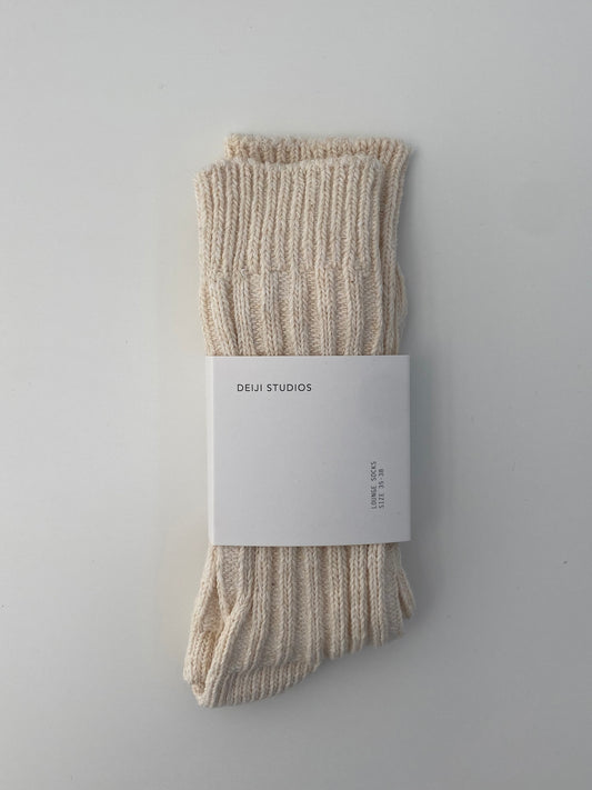 the woven sock - cream by Deiji Studios against plain background